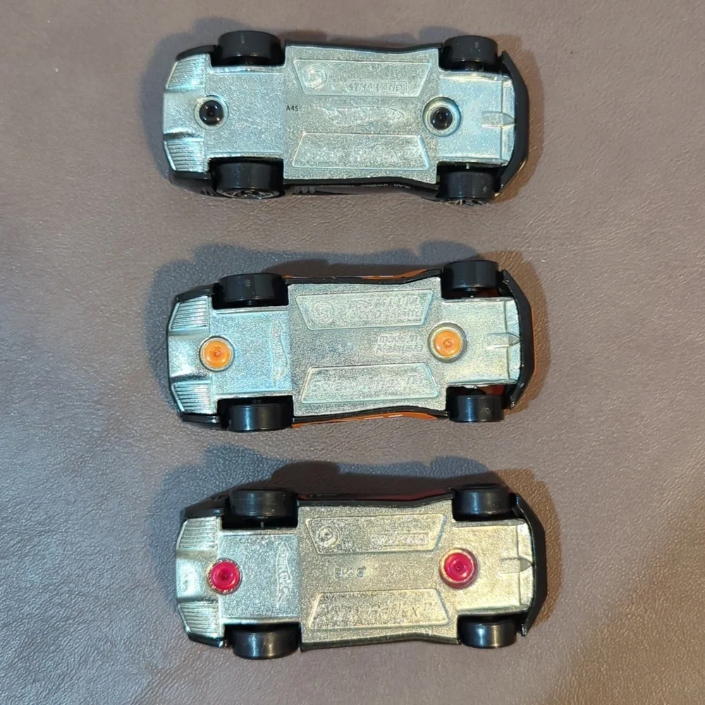 3 Hot Wheels solar reflex 2007 black gold red orange loose